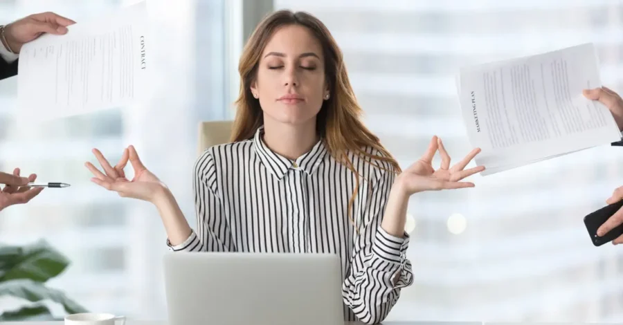 Woman Meditating At Work | How To Manage Stress At Work | Breaking Dawn Therapy