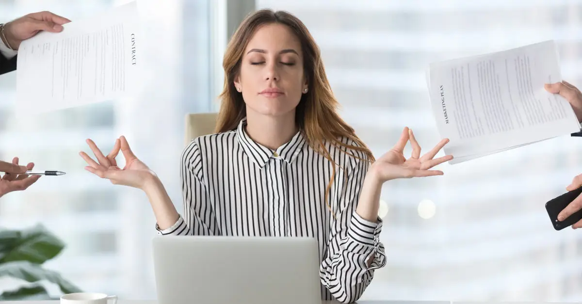 Woman Meditating At Work | How To Manage Stress At Work | Breaking Dawn Therapy