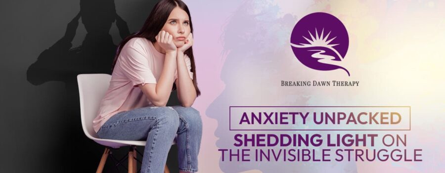 Child Sitting In A Chair With Their Elbows on Their Knees and Palms on Their Chin | Anxiety Unpacked: Shedding Light On The Invisible Struggle | Breaking Dawn Therapy