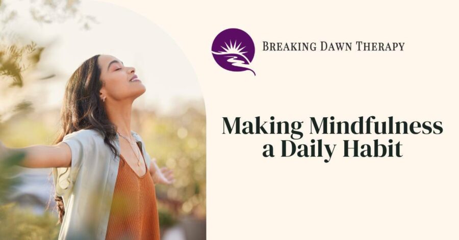 A Woman With Her Arms Spread Open With Her Eyes Closed Feeling at Peace | Making Mindfulness a Daily Habit | Breaking Dawn Therapy