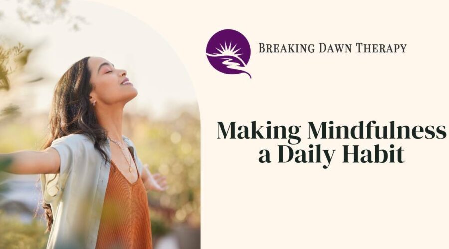 A Woman With Her Arms Spread Open With Her Eyes Closed Feeling at Peace | Making Mindfulness a Daily Habit | Breaking Dawn Therapy