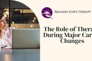 Person doing online therapy during major career changes. Breaking Dawn Therapy